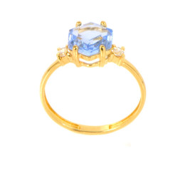 Anillo oro 18 kilates topacio azul exágono.