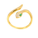 Anillo oro amarillo serpiente 18 kilates circonitas esmeraldas